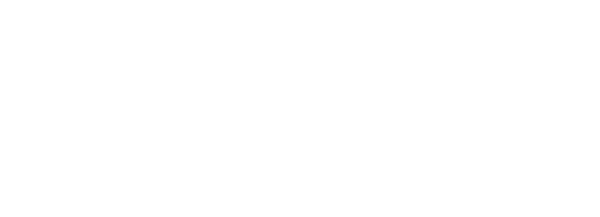 Modern white apartment building with balconies and windows